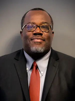 Bomani Brown, Director of Compliance