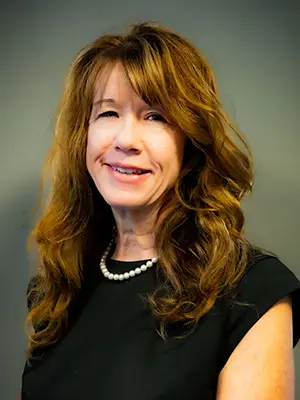 Caren Singleton, Deputy Director